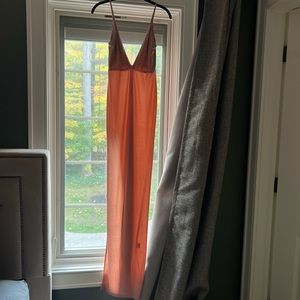 Long baby pink maxi dress with a high slit